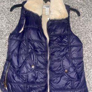 Navy bubble vest with Sherpa inside size Small women’s / brand new with tags
